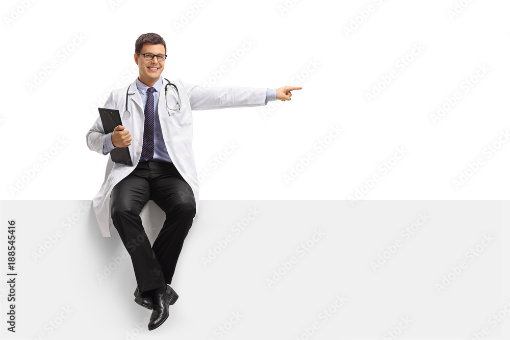 Doctor with a clipboard sitting on a panel and pointing Doctor with a clipboard sitting on a panel and pointing