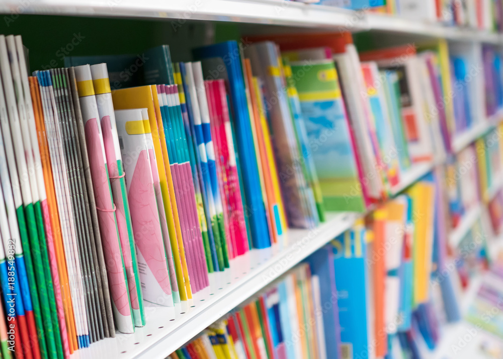 School notebooks on shelf in bookstore. School notebooks on shelf in bookstore.
