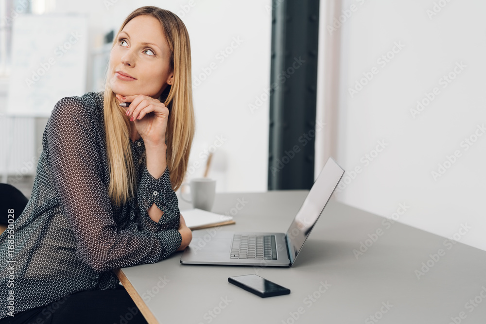 Beautiful woman daydreaming about future plans Beautiful woman daydreaming about future plans