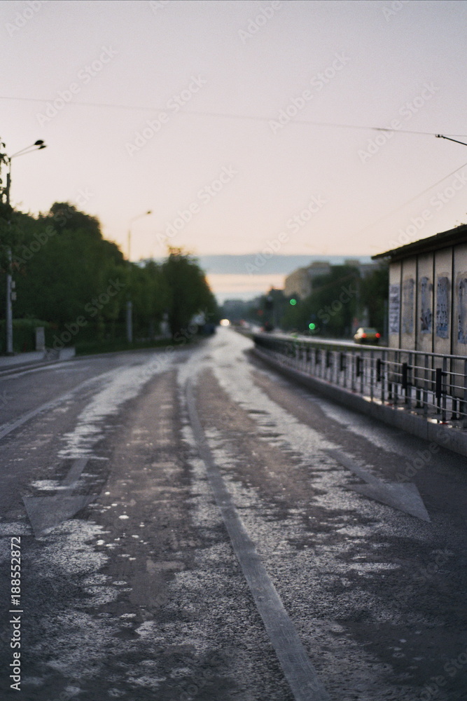 Empty road in the city at sunrise