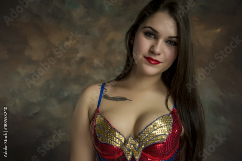 beautiful young woman in her 20's in a close-up portrait in studio