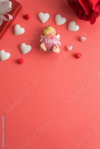 Flat view of valentines hearts and decoration on pink background with copy space. Symbol of love. Happy Valentines Day background.Saint Valentine's Day concept. © kamon_saejueng