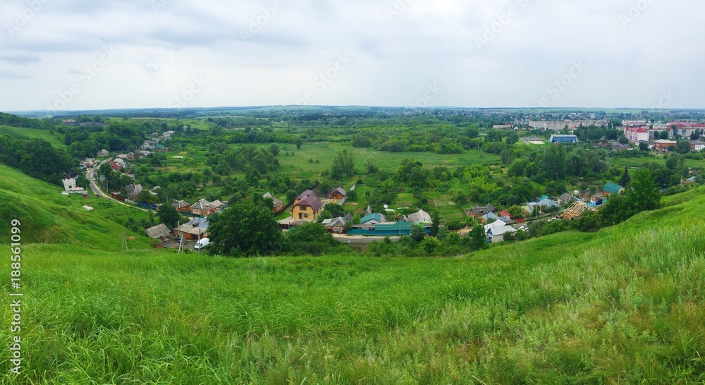 Beautiful summer green landscape view of the village 