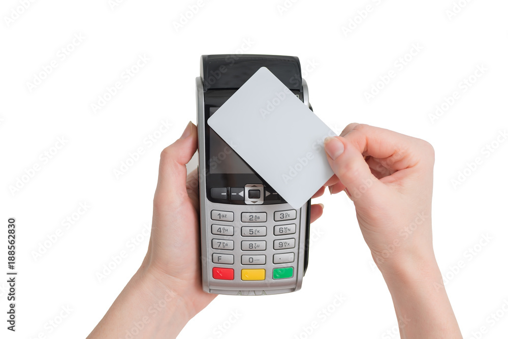 payment with NFC tecnology credit card on pos terminal in woman hands isolated on a white background payment with NFC tecnology credit card on pos terminal in woman hands isolated on a white background