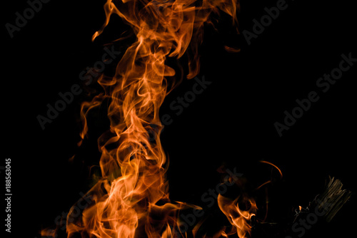 Flame of the bonfire on dark background