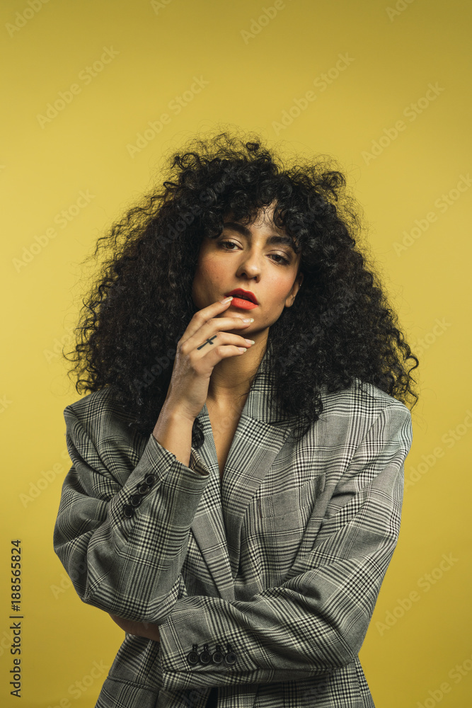 Curly woman in studio Curly woman in studio