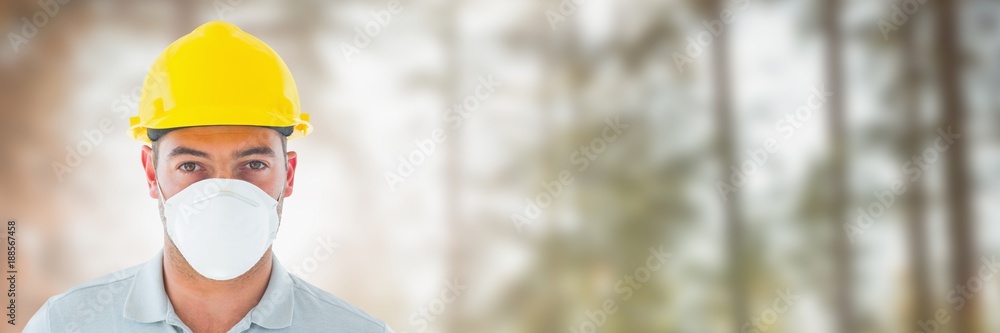 Construction Worker on building site by forest Construction Worker on building site by forest