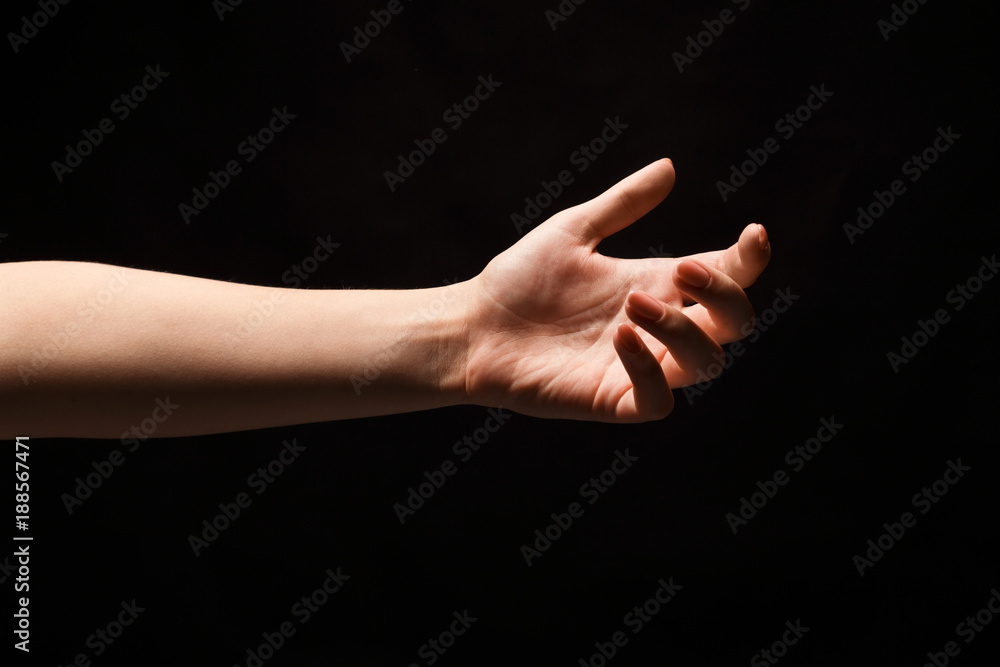 Outstretched female hand offering or asking for help