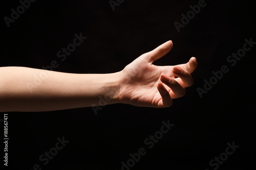 Outstretched female hand offering or asking for help