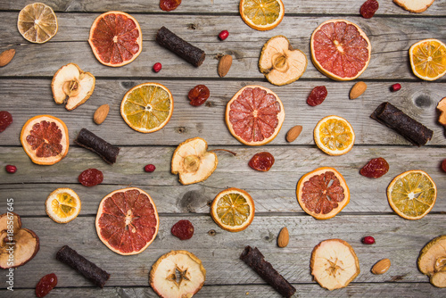 Different dried fruits on a wooden surface