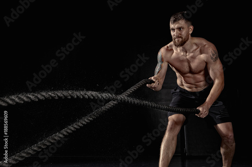 Crossfit training. Ropes photo