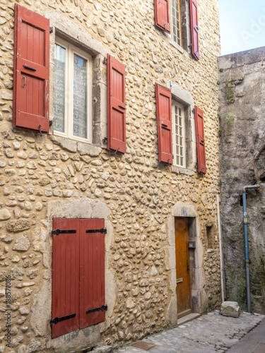 Traditional old classic buildings architecture, windows and doors, in countryside area of France