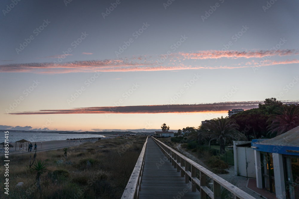 Alvor boardwalk at sunset 