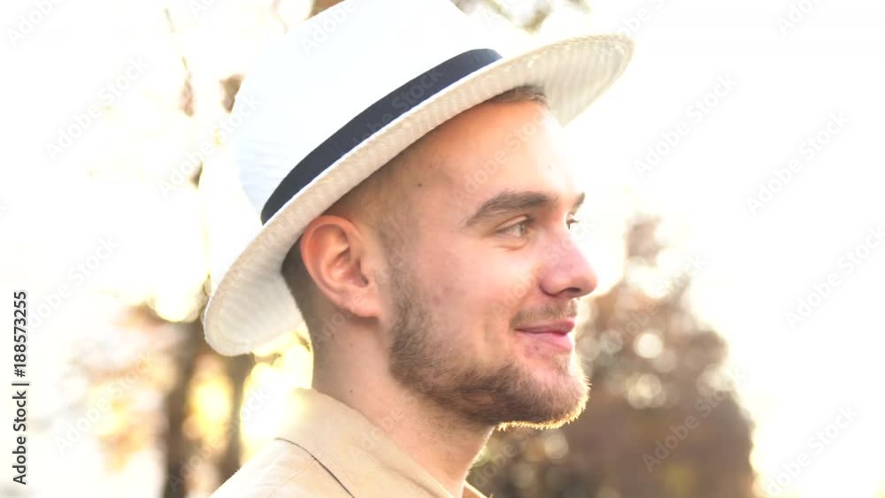 Man looking at camera and smiling in beautiful sunset light. 4k Man looking at camera and smiling in beautiful sunset light. 4k