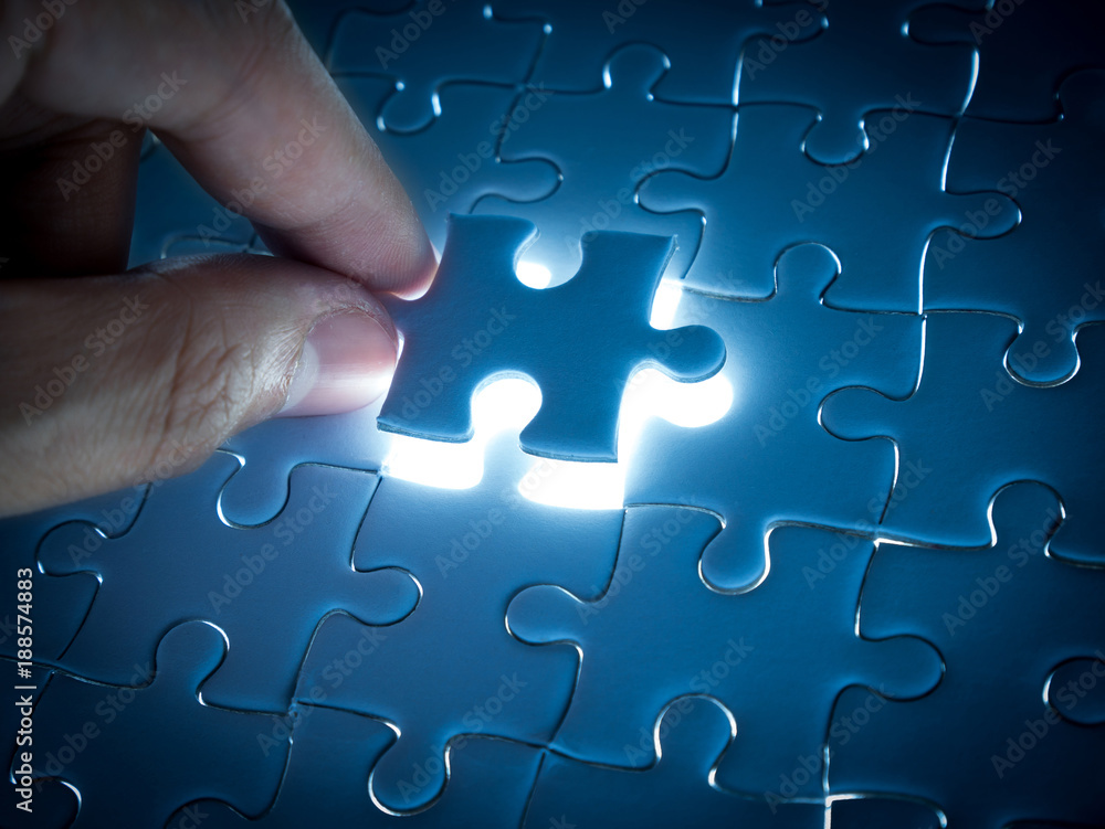 Missing Jigsaw puzzle piece with lighting, business concept for