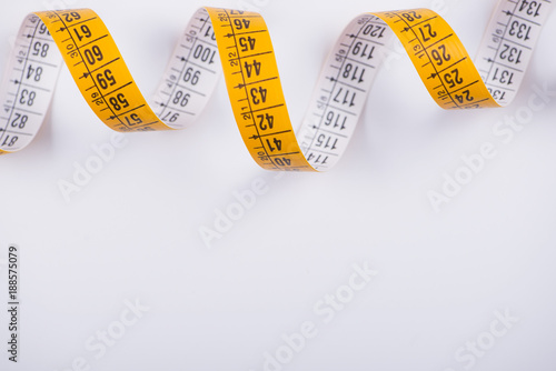 Measuring tape on white background. Isolated.