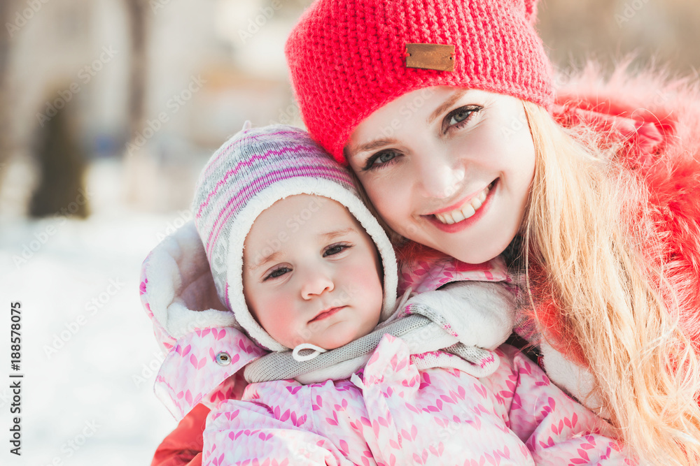 Portrait of mother and daughter in winter Portrait of mother and daughter in winter