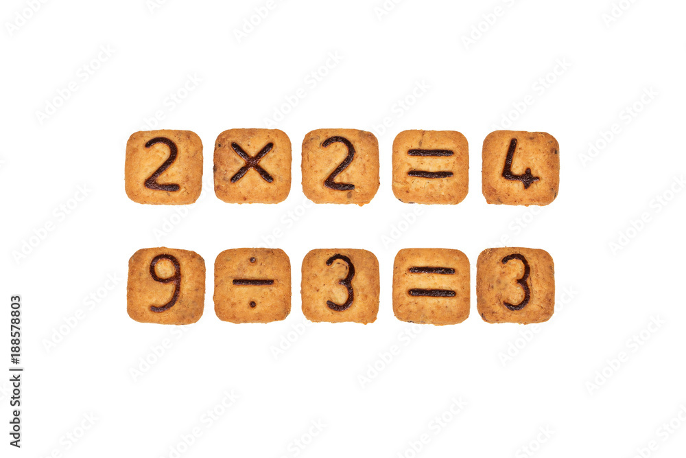 Sums made of square cookies with chocolate numerals on them. Isolated on white background. Idea of funny and easy math learning during eating. Flat lay. Sums made of square cookies with chocolate numerals on them. Isolated on white background. Idea of funny and easy math learning during eating. Flat lay.