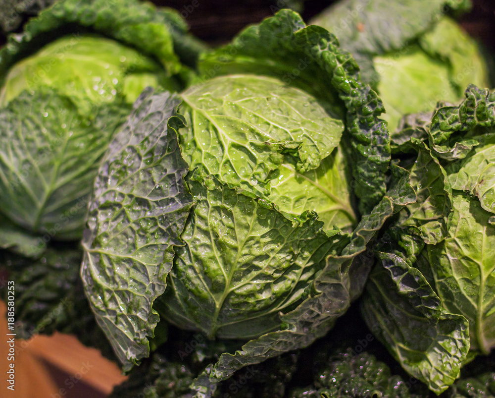 Fototapeta premium Savoy cabbage super food on market stall at organic farmers grocery store.