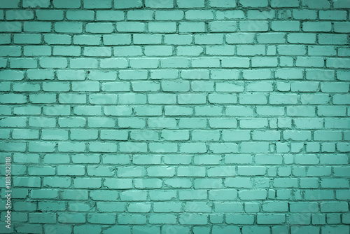 Green brick wall texture or background painted in green color.