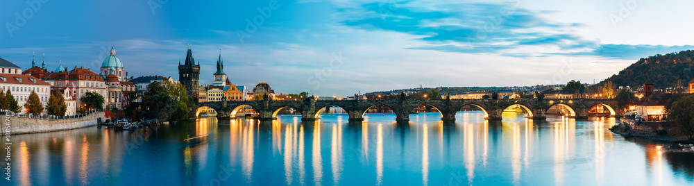 Night panorama scene with Charles Bridge in Prague, Czech Republic
