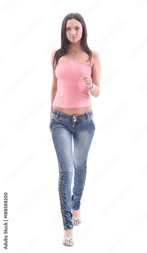 Picture of a young casual woman standing isolated on white