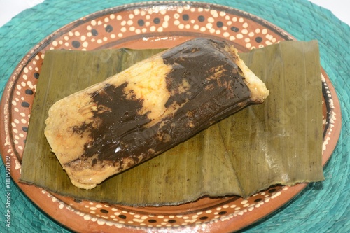 Mexican tamal from Oaxaca state made of chicken and mole sauce for Candelaria celebration on Febrary