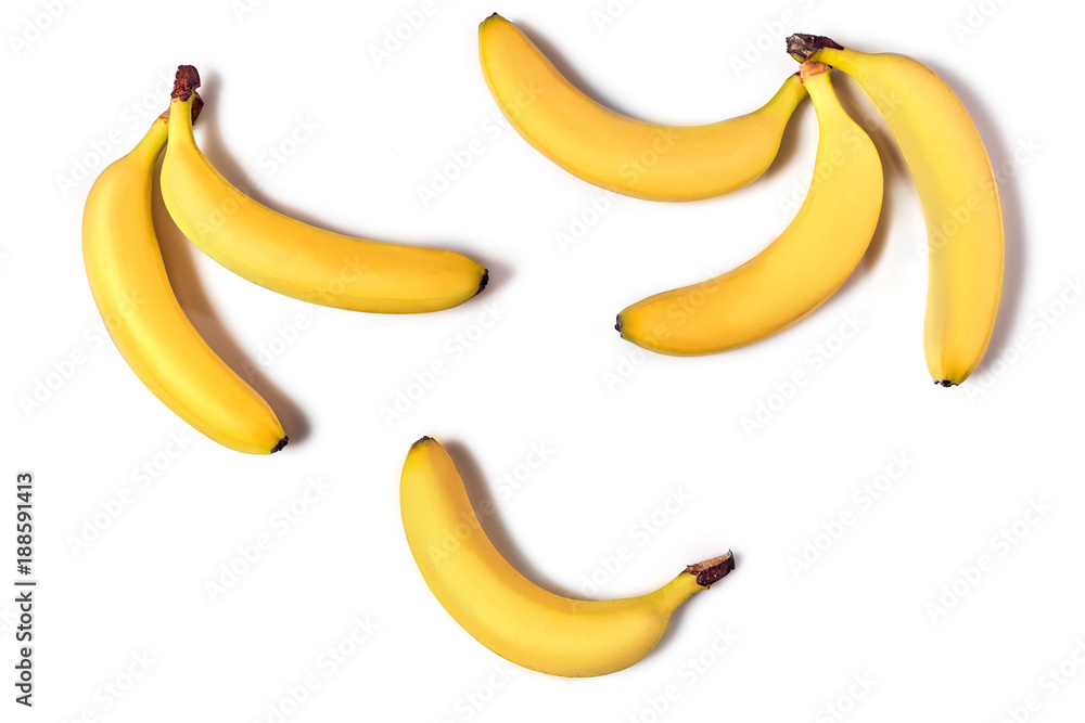 Ripe yellow bananas on a white background