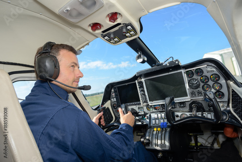 rear view of male helicopter pilot