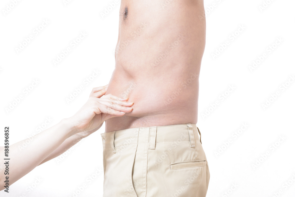 Fototapeta premium 太った男性のお腹をつまむ