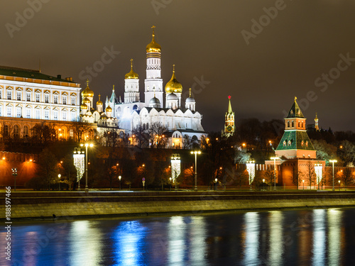 Night december Kremlin historical center of Moscow, Russia. Pretty christmas Moscow river illuminated with sparks, 2018.