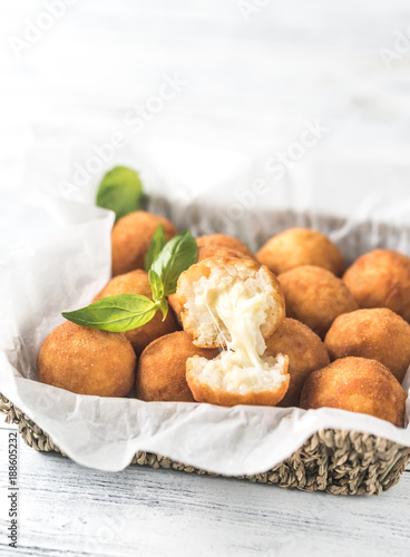 Rustic bowl of arancini photo