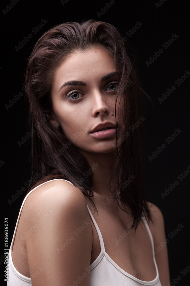 young adult woman with clean fresh skin and wet hair young adult woman with clean fresh skin and wet hair