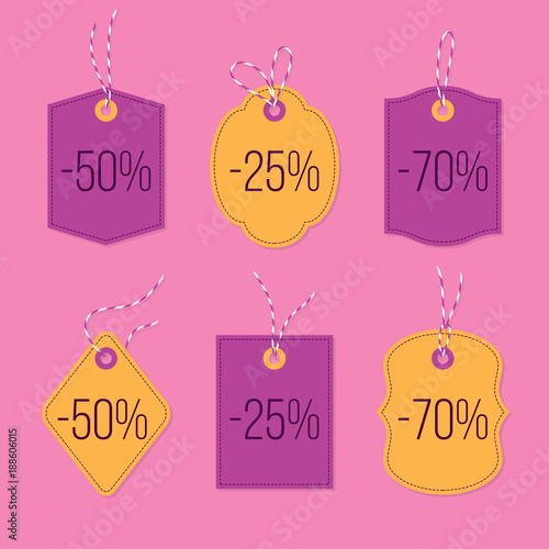 Discount price tags tied up with baker twine bows and ribbons set. Paper labels of different shapes