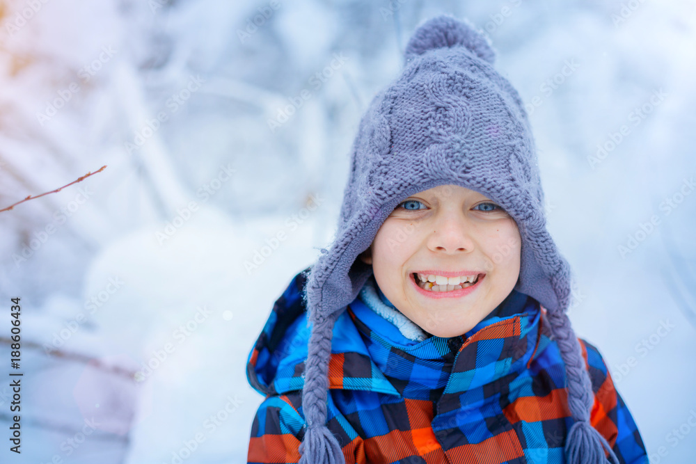 Beautiful young boy in winter park Beautiful young boy in winter park