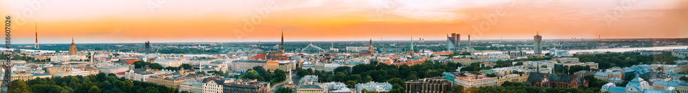 Riga, Latvia. Aerial View Panorama Cityscape At Sunset. TV Tower