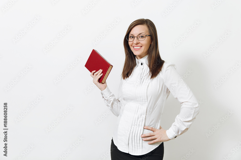 Beautiful happy caucasian young smiling brown-hair business woman in white shirt black skirt glasses with red book isolated on white background. Manager, worker, student. Copy space for advertisement.