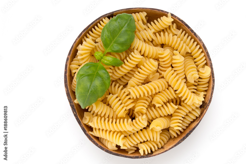 Uncooked fusilli pasta isolated white background. Uncooked fusilli pasta isolated white background.