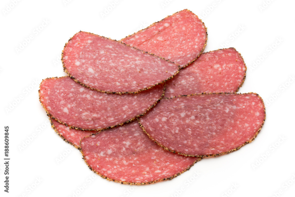 Salami slices isolated on the white background. Salami slices isolated on the white background.
