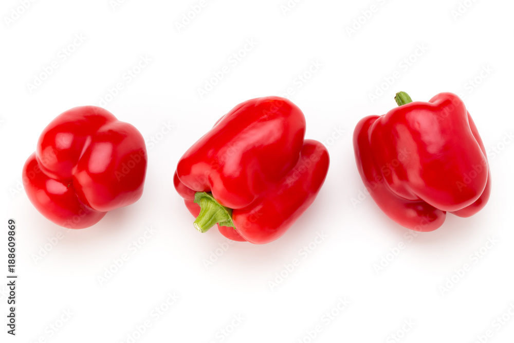 Red bell pepper with half and leaves isolated on white. Red bell pepper with half and leaves isolated on white.
