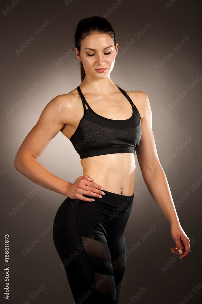 Active young fit woman with perfect body pose Active young fit woman with perfect body pose