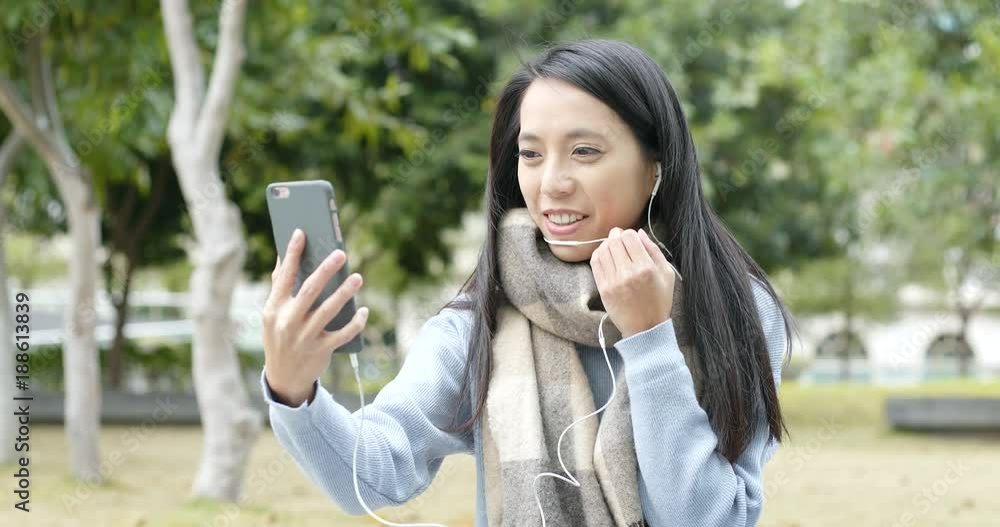 Woman talk to video call on cellphone Woman talk to video call on cellphone