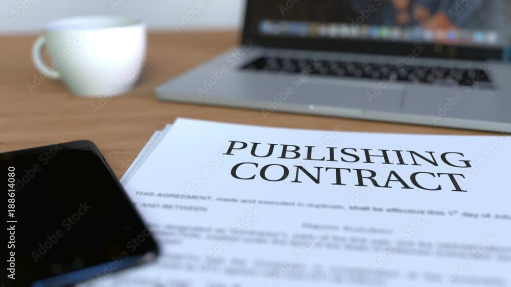 Copy of publishing contract on the desk Copy of publishing contract on the desk