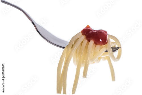 spaghetti on fork on white background