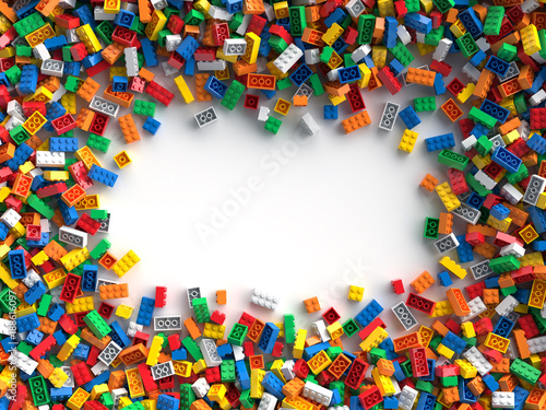 Colored toy bricks with place for your content. Banner frame made from multicolored toy bricks with blank space in center