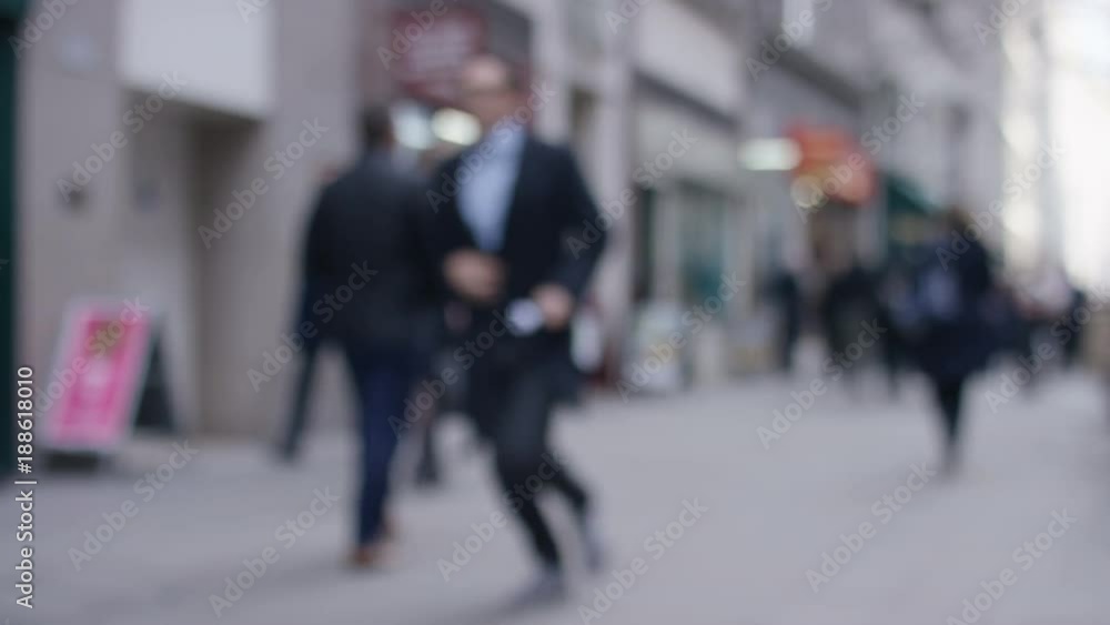Blurred background of pedestrians on a busy high street, in slow motion Blurred background of pedestrians on a busy high street, in slow motion