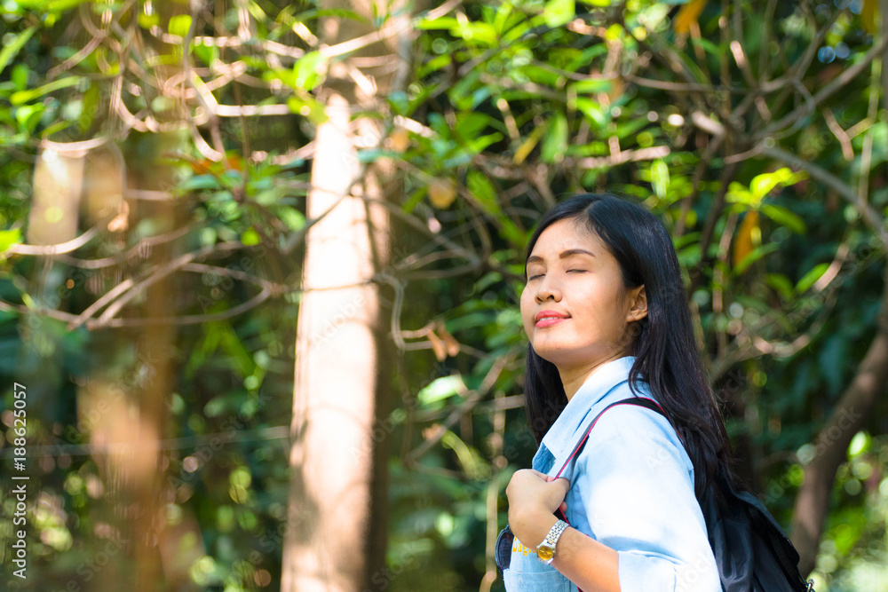 Woman with backpack in nature concept relax Woman with backpack in nature concept relax