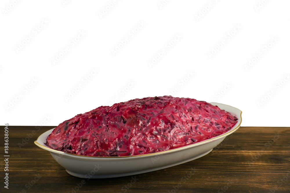 Russian traditional multicomponent salad with boiled vegetables and herring. Russian traditional multicomponent salad with boiled vegetables and herring.
