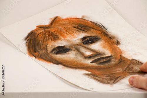Billede på lærred Drawing by sanguine pencil and charcoal. Portrait of a man.