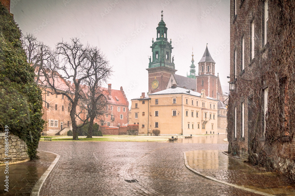 Wawel castle in Krakow during a snowy day at Christmas, the historic Polish city, Europe.